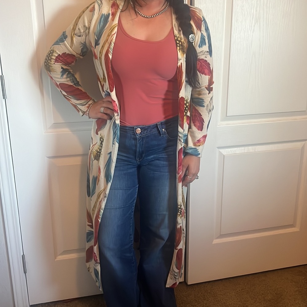 Long cardigan with feathers